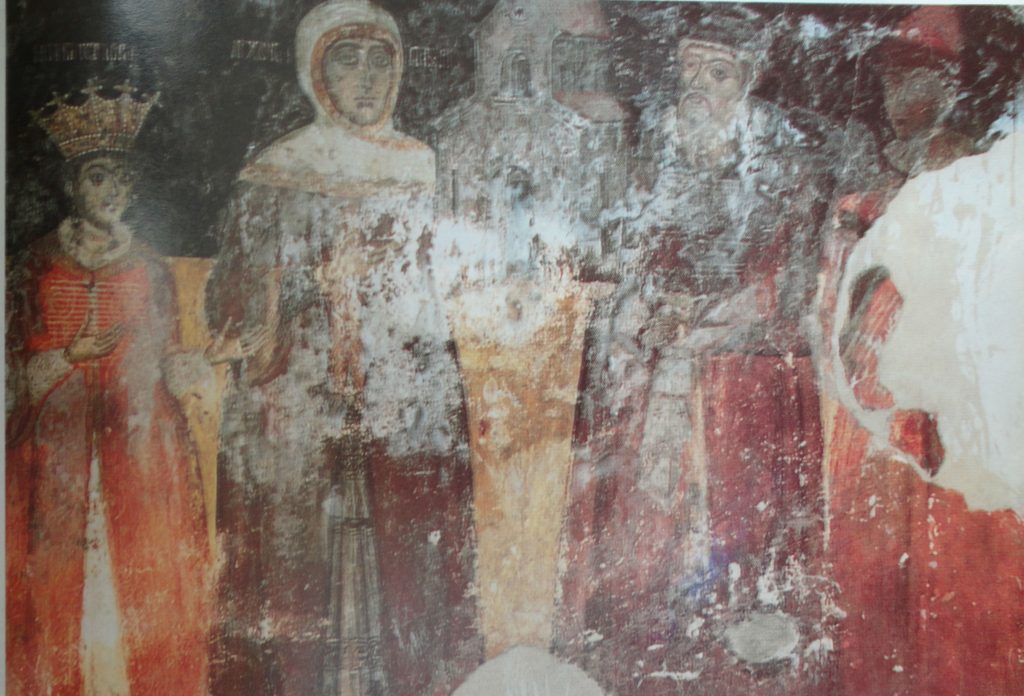 Nica, originar din satul Frastani, azi situat în Grecia, aproape de graniţa cu Albania. Şi-a început cariera în Ţara Românească în timpul domniei lui Mihai Viteazul (1593-1601). A ajuns mare logofăt al ţării. În tabloul votiv de mai sus, care provine din biserica mănăstirii zidite de el în satul natal (vezi mai jos), este reprezentat alături de soţia sa Păuna, de fiul Preda şi de fiica Marica. Descendenţii lui nu au părăsit niciodată Ţara Românească. (sursa imaginii: D. KAMAROULIAS, Τα μοναστήρια της Ηπείρου, I, Atena 1996, p. 227)